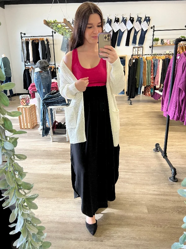 Smocked Maxi Skirt in Black silk skirt sleek